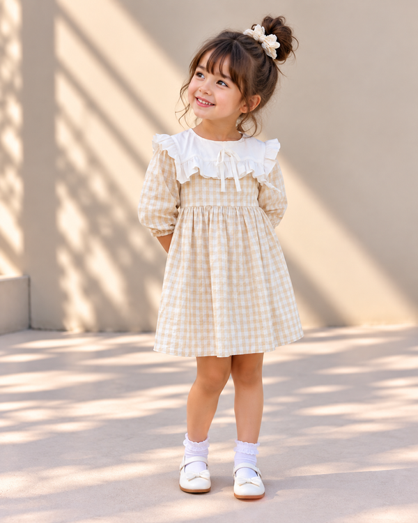 The Little Sunshine Bib Dress
